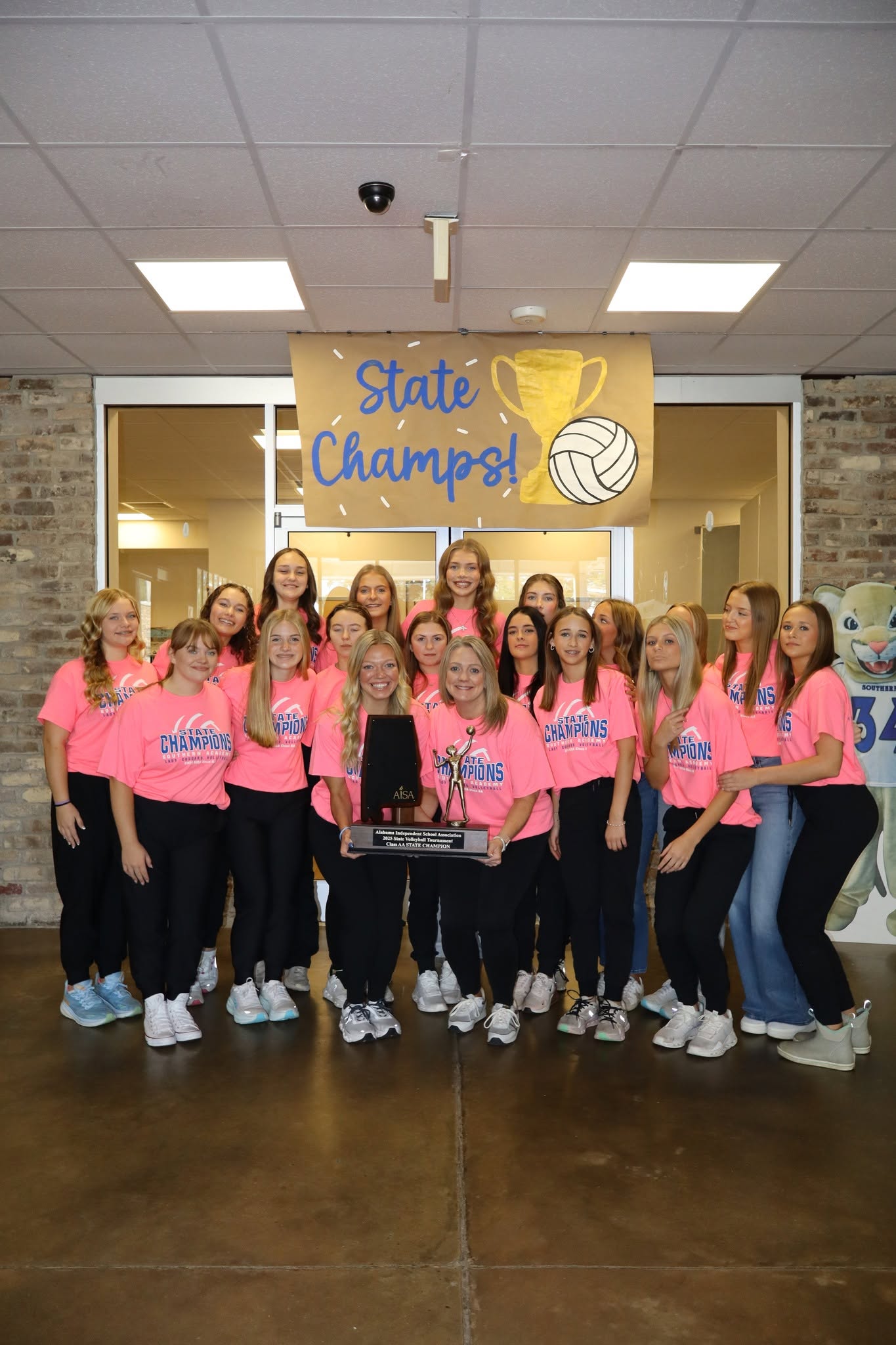 volleyball varsity champs with coaches
